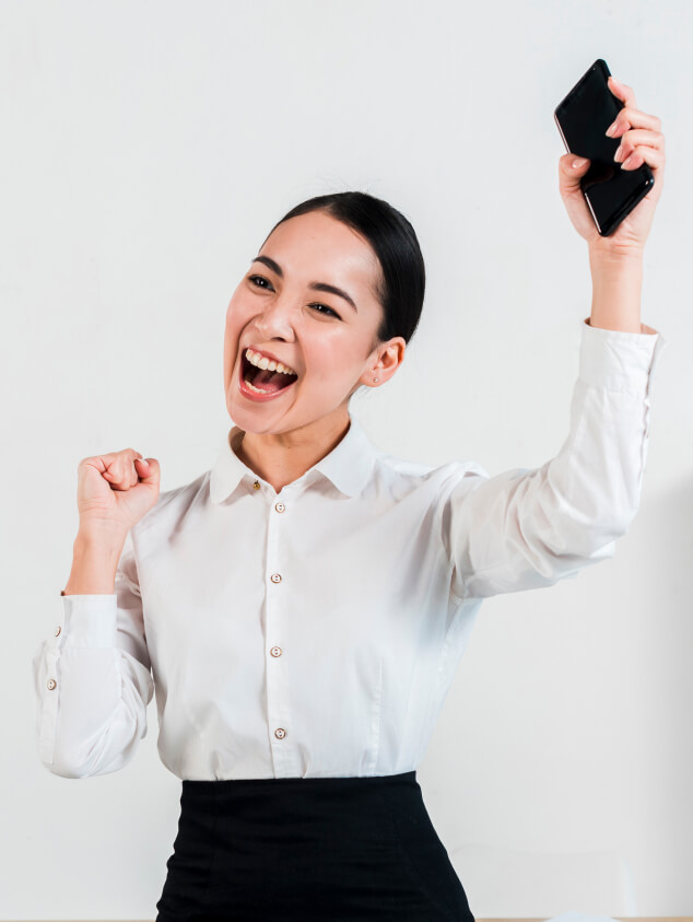 Woman celebrating with phone
